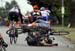 Amiel FLETT-BROWN (Musette Racing) crashes over Stephen ROCKWOOD (Stevens Racing p/b The Cyclery) 		CREDITS:  		TITLE:  		COPYRIGHT: